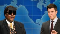 Kenan Thompson and Colin Jost talk during a Weekend Update bit on SNL.