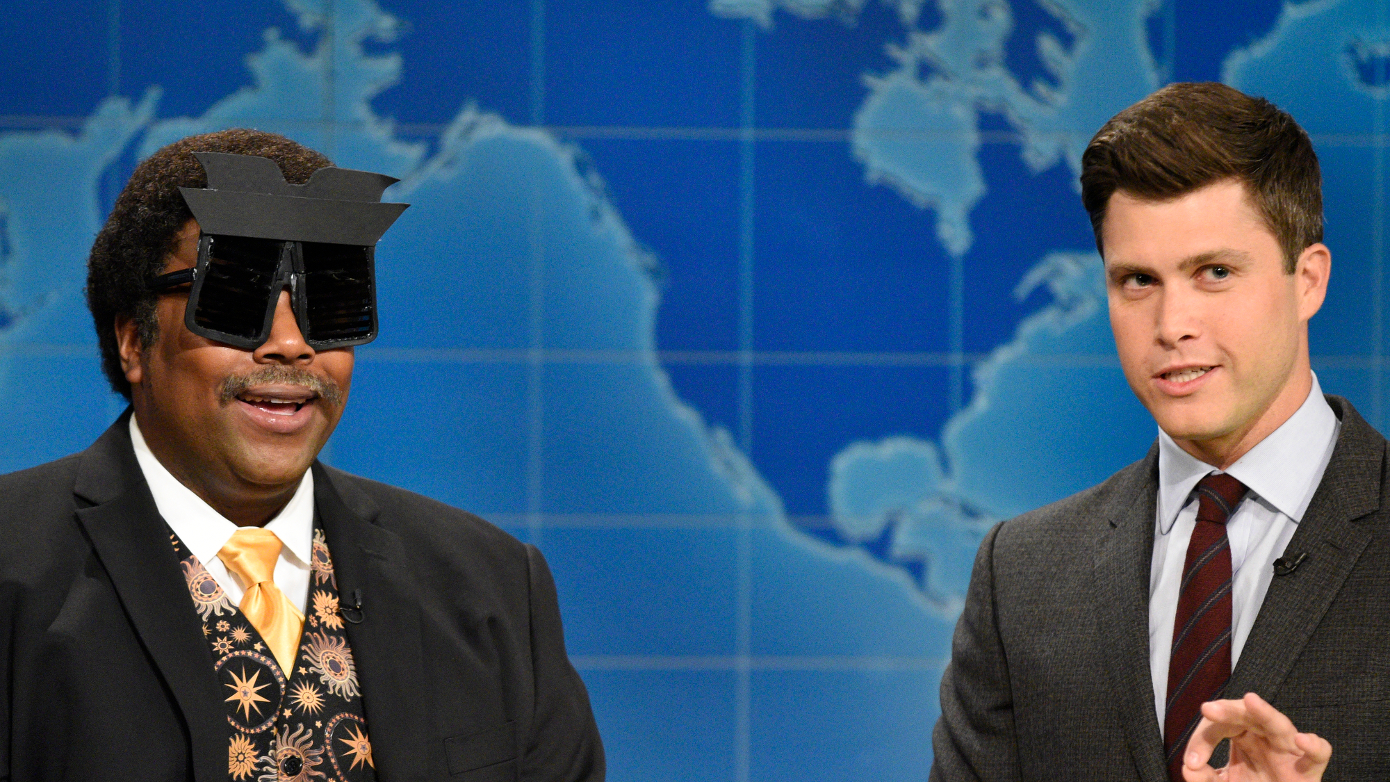 Kenan Thompson and Colin Jost talk during a Weekend Update bit on SNL.