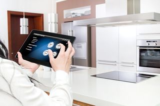 Tablet Controlling Kitchen Devices