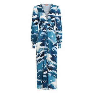 A cutout of the blue Kitri Aurora Cloud Print Maxi Dress on a white background