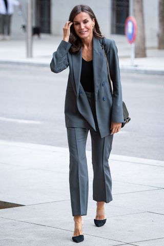 Queen Letizia wearing a grey suit