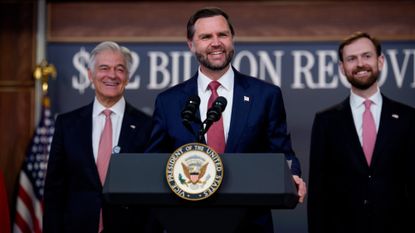 Vice President JD Vance Holds News Conference On FraudWASHINGTON, DC - SEPTEMBER 22: Vice President J.D. Vance (C), accompanied by Administrator for the Centers for Medicare & Medicaid Services Dr. Mehmet Oz (L), and Federal Trade Commission (FTC) Chair Andrew Ferguson (R), smiles during a news conference on fraud at the Eisenhower Executive Office Building on the White House Campus on September 22, 2026 in Washington, DC. Vance announced a federal crackdown on Affordable Care Act fraud, removing over 750,000 allegedly ineligible enrollments and banning hundreds of suspect brokers to save taxpayers an estimated $2.2 billion. (Photo by Andrew Harnik/Getty Images)