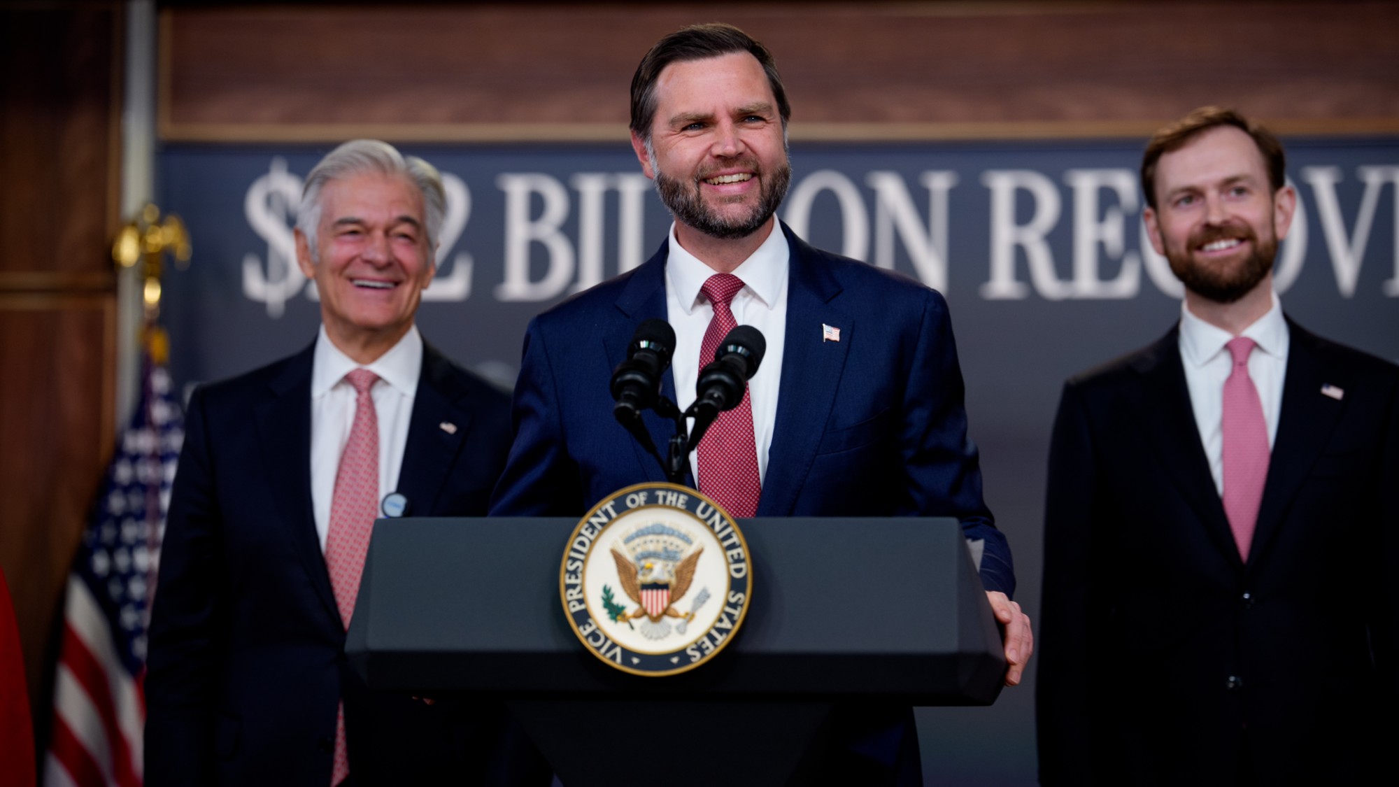 Vice President JD Vance Holds News Conference On FraudWASHINGTON, DC - SEPTEMBER 22: Vice President J.D. Vance (C), accompanied by Administrator for the Centers for Medicare &amp; Medicaid Services Dr. Mehmet Oz (L), and Federal Trade Commission (FTC) Chair Andrew Ferguson (R), smiles during a news conference on fraud at the Eisenhower Executive Office Building on the White House Campus on September 22, 2026 in Washington, DC. Vance announced a federal crackdown on Affordable Care Act fraud, removing over 750,000 allegedly ineligible enrollments and banning hundreds of suspect brokers to save taxpayers an estimated $2.2 billion. (Photo by Andrew Harnik/Getty Images)