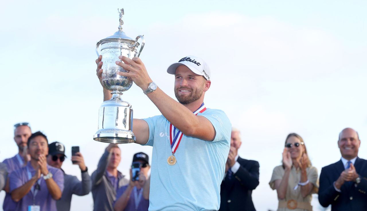 Wyndham Clark holds the US Open trophy