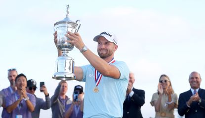 Wyndham Clark holds the US Open trophy