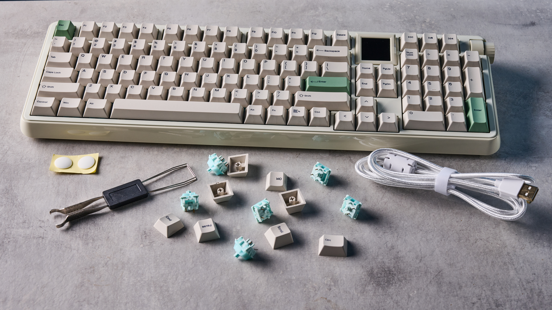 A white Epomaker RT100 Pro wireless mechanical keyboard
