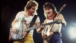 Rock musicians Michael Anthony and Eddie Van Halen (1955 - 2020), both of the group Van Halen, performs onstage at the Rosemont Horizon, Rosemont, Illinois, March 15, 1986. 