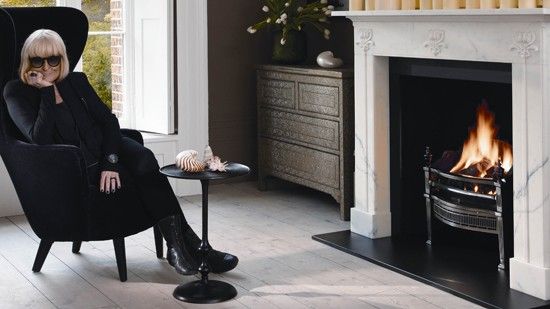 barbara hulanicki seating in living room near fireplace