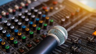 Microphone on a mixing desk 