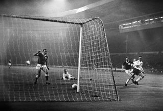 Jimmy Greaves scores for England against Northern Ireland in November 1963.