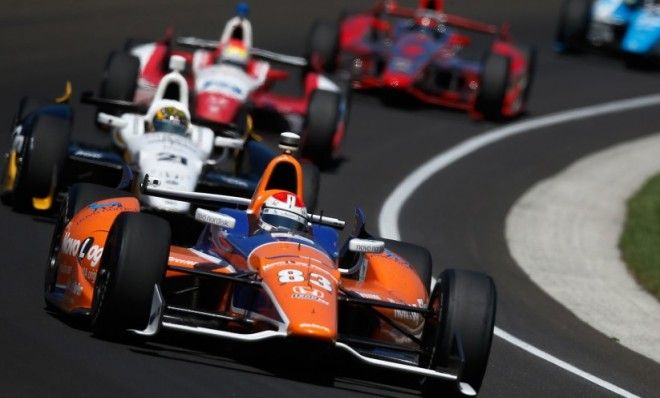 Charlie Kimball leads a pack of cars during final practice on Carb Day for the 97th Indianapolis 500 mile race at Indianapolis Motor Speedway on May 24, 2013 in Indianapolis, Indiana.