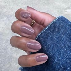A glossy mauve manicure