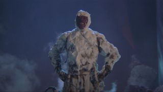 Ernie Hudson stands heroically, covered in marshmallow in Ghostbusters.