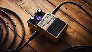 The Boss RT-2 Rotary Ensemble pictured in close-up against a wooden floor.