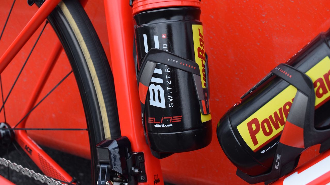 Elite Vico carbon bottle cages are paired with Elite bottles