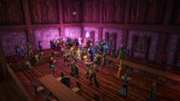 A group of Project: Gorgon players celebrate inside a tavern.