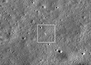 photo of the moon's surface taken from lunar orbit, showing many small craters in the gray terrain
