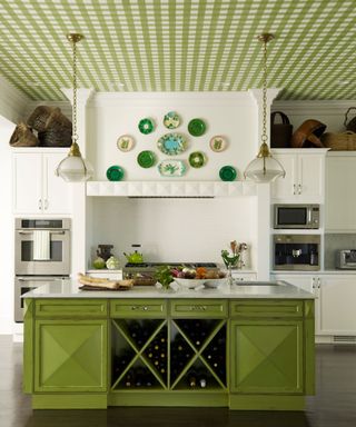 Green kitchen with green and white checkered wallpapered ceiling