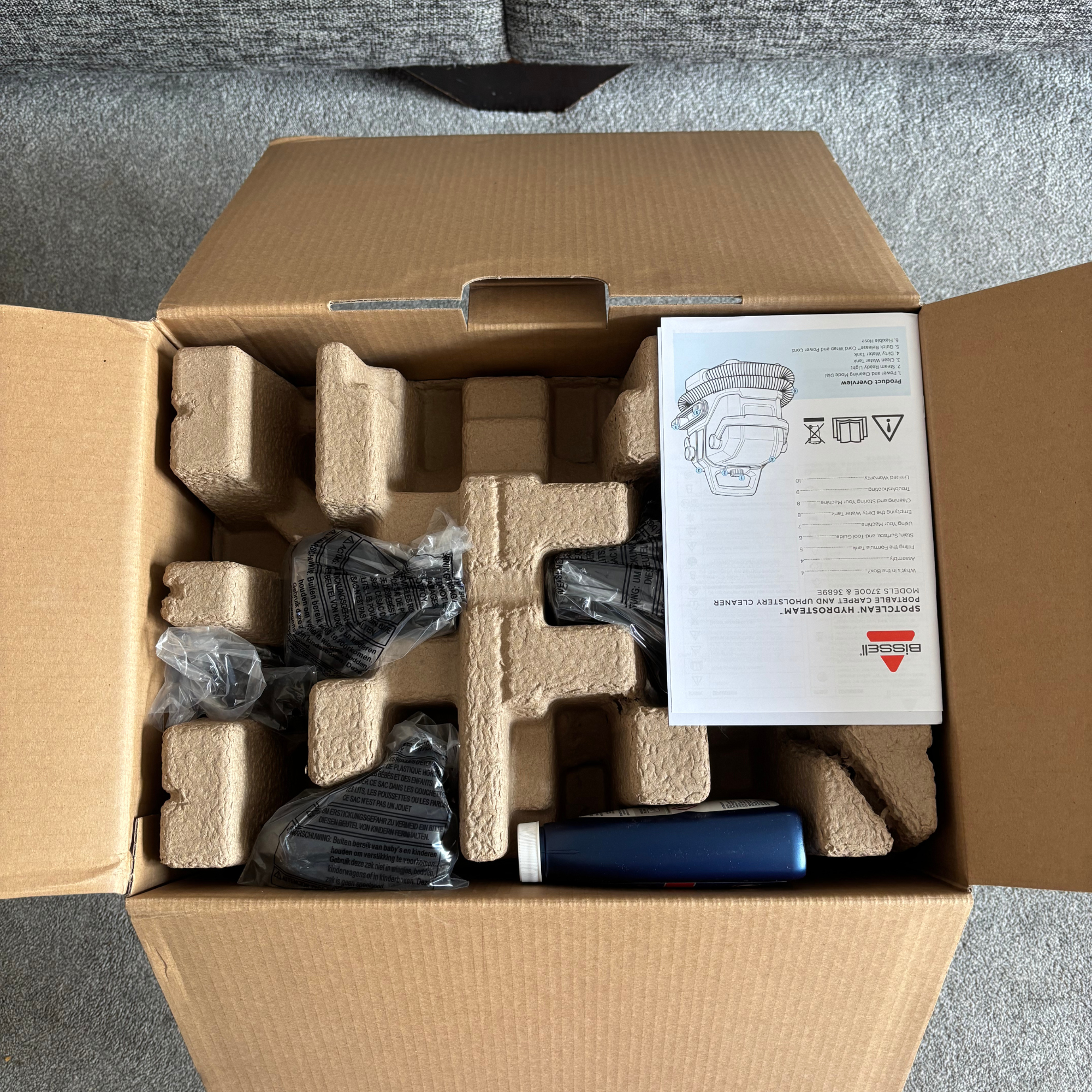 Bissell SpotClean HydroSteam packaging opened view