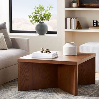 A dark brown wooden square coffee table that's one of the best Target furniture pieces.