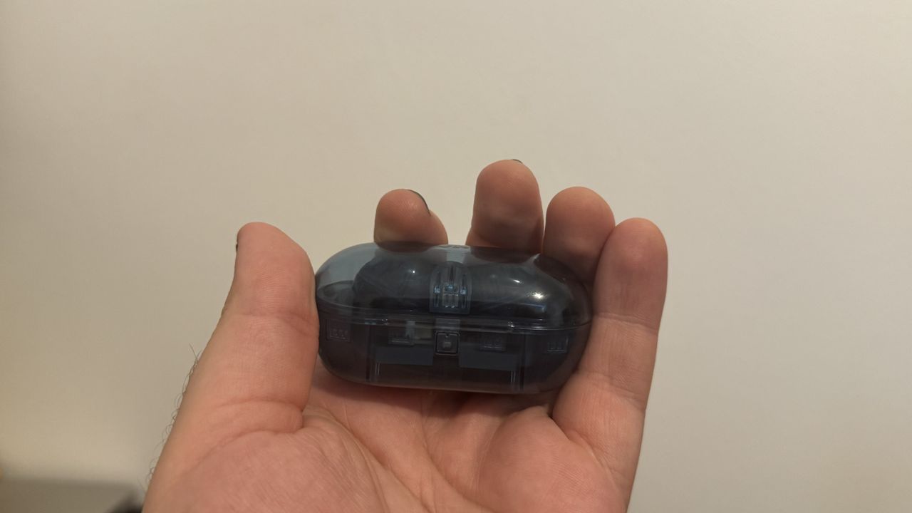 Sony WF-C710N earbuds in a hand
