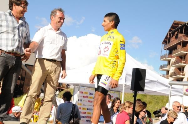 Alexander Quintanarojas is congratulated by Bernard Hinault.