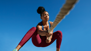 Woman exercising with rope