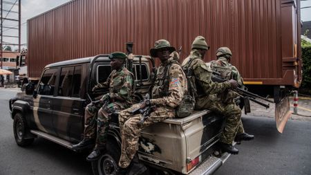 Members of the M23 movement patrol the border between Rwanda and Congo on March 1, 2025.