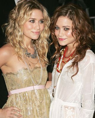 The Olsen twins with tighter curls in their hair at an event in 2005.