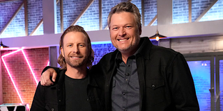 Dierks Bentley stands with Blake Shelton on The Voice