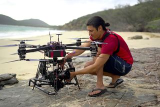 "Chasing Coral" producer and director Jeff Orlowski inspects a custom-built camera drone.