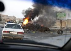 Anti-Gaddafi forces check cars in Zintan, Libya