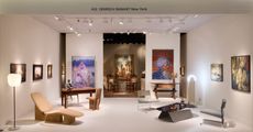 TEFAF 2024 display with neutral furniture and colourful paintings