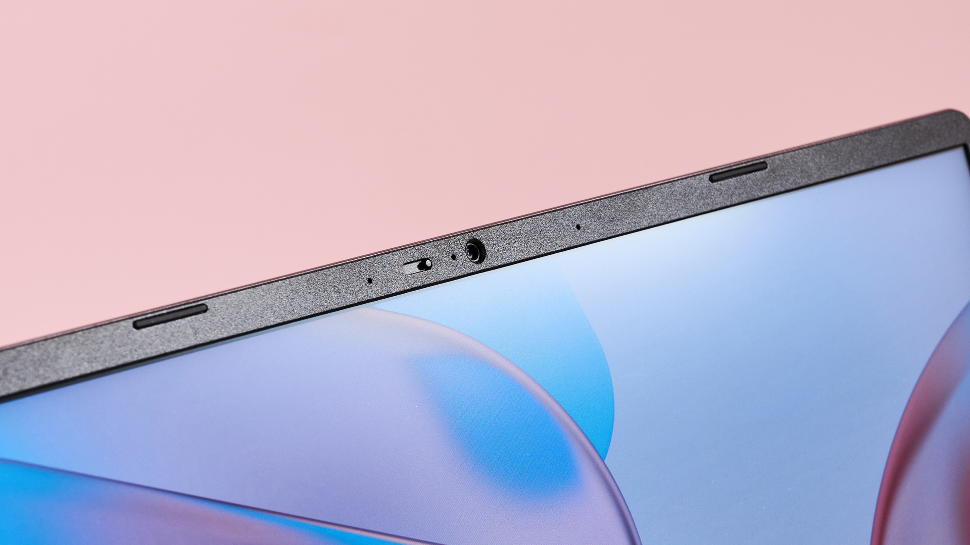 Close-up of webcam on Acer Chromebook Plus 514 with pink background