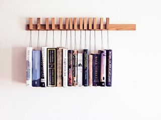 Make an interior design statement for your studio with this beautiful book rack