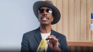 JB Smoove enthusiastically holds a canned cocktail for White Claw Vodka.