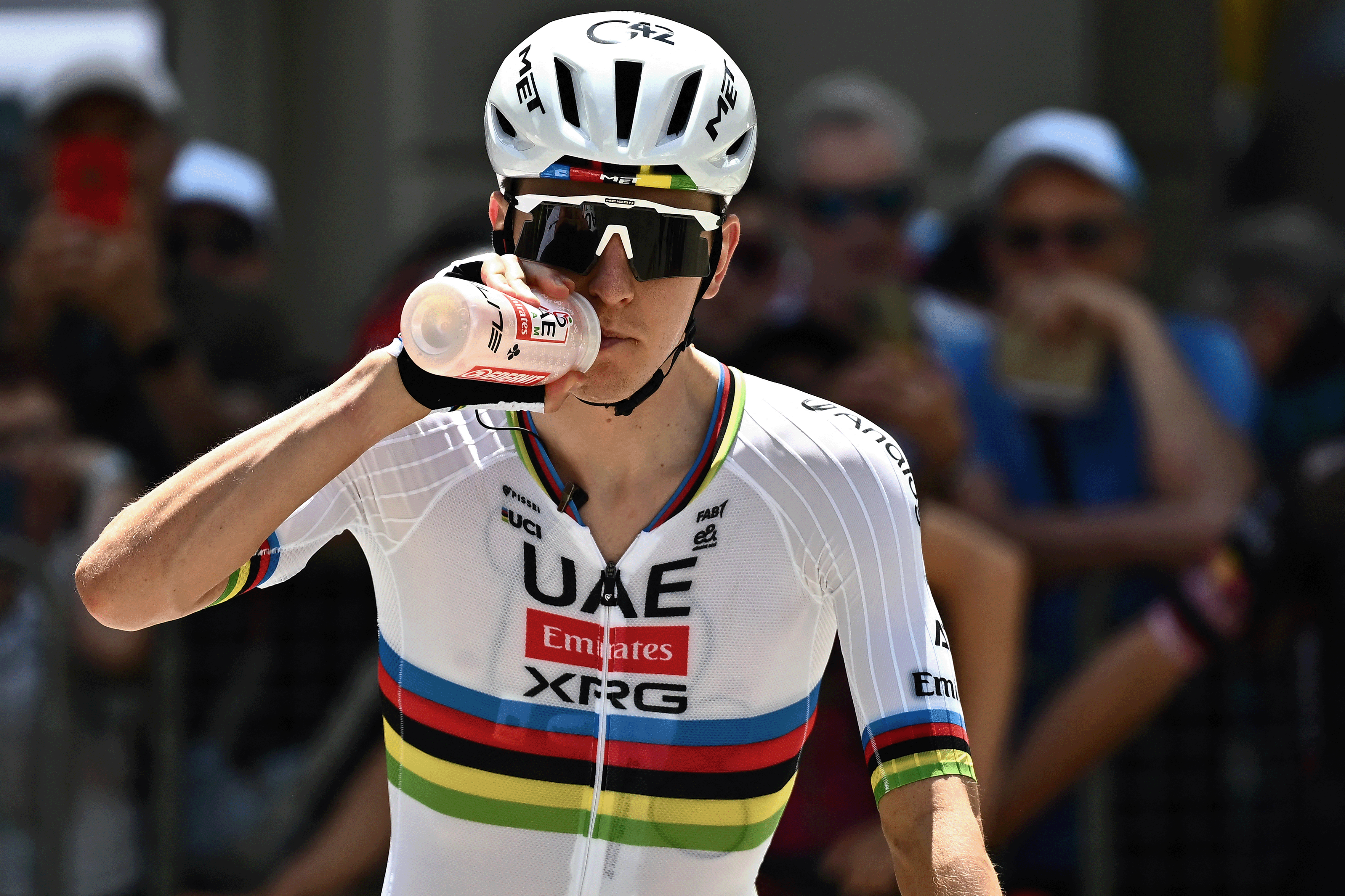 Slovenia's rider Tadej Pogacar of team UAE Emirates - XRG prepares to take the start of the first stage of the Men's Tour of Switzerland (Tour de Suisse) cycling race, in Sondrio, Italy, on June 17, 2026. (Photo by Marco BERTORELLO / AFP via Getty Images)