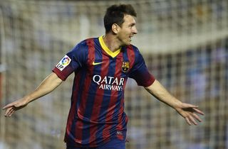 Lionel Messi celebrates after scoring for Barcelona against Valencia at Mestalla in September 2013.