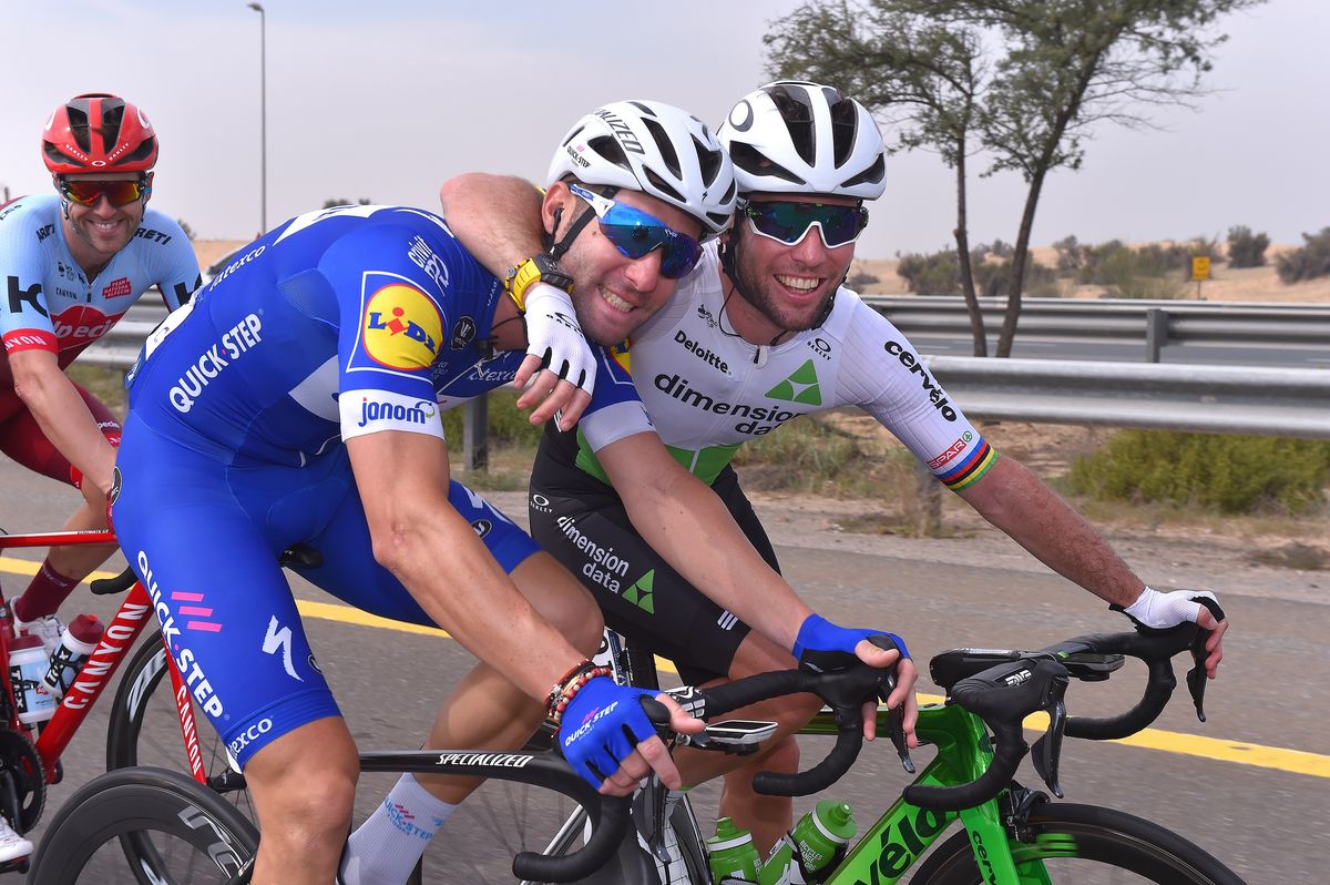 Former teammates Mark Cavendish and Fabio Sabatini pose for the camera