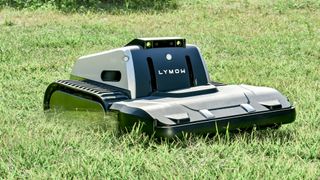 Lymow One Plus robot mower on a lawn