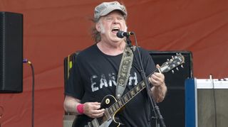 Neil Young performs on Day 7 of 2024 New Orleans Jazz & Heritage Festival at Fair Grounds Race Course on May 04, 2024 in New Orleans, Louisiana.