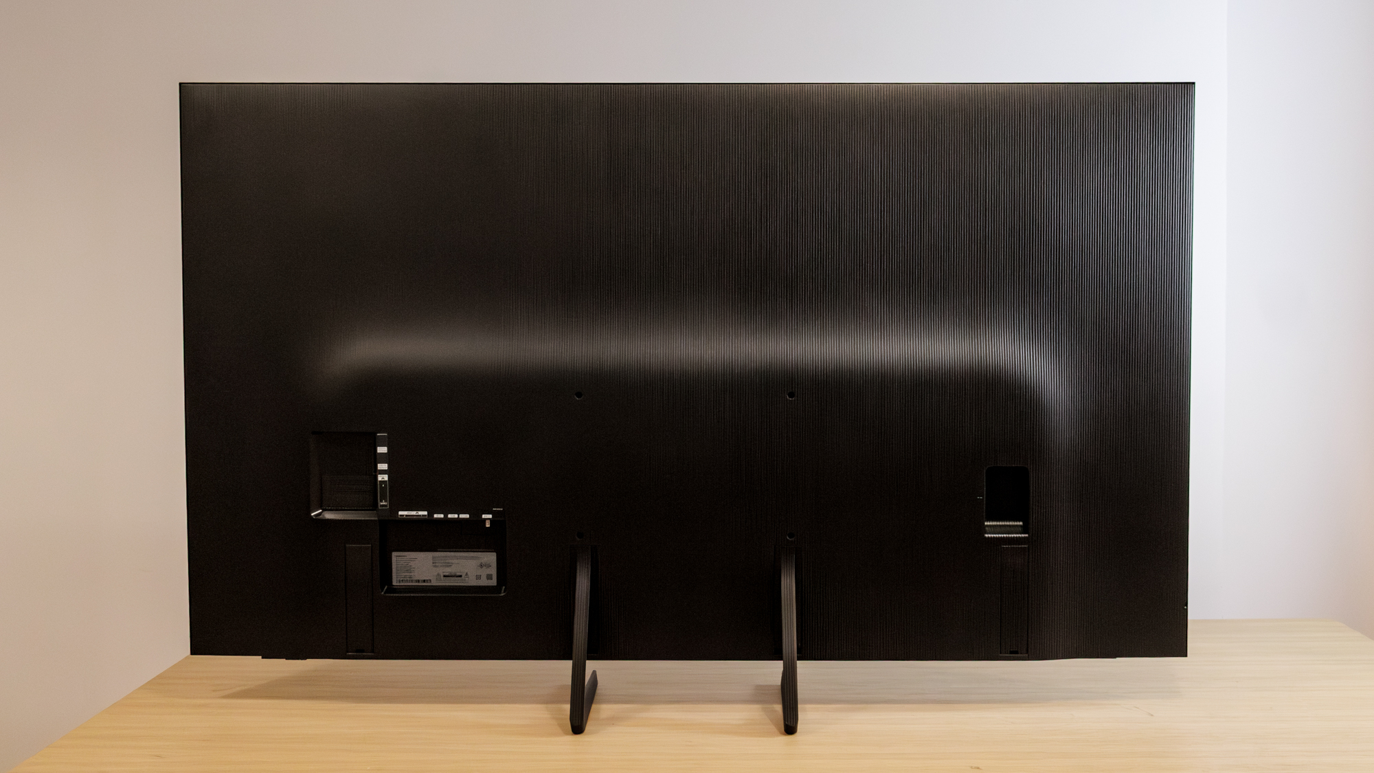 Samsung OLED S85F TV on a table