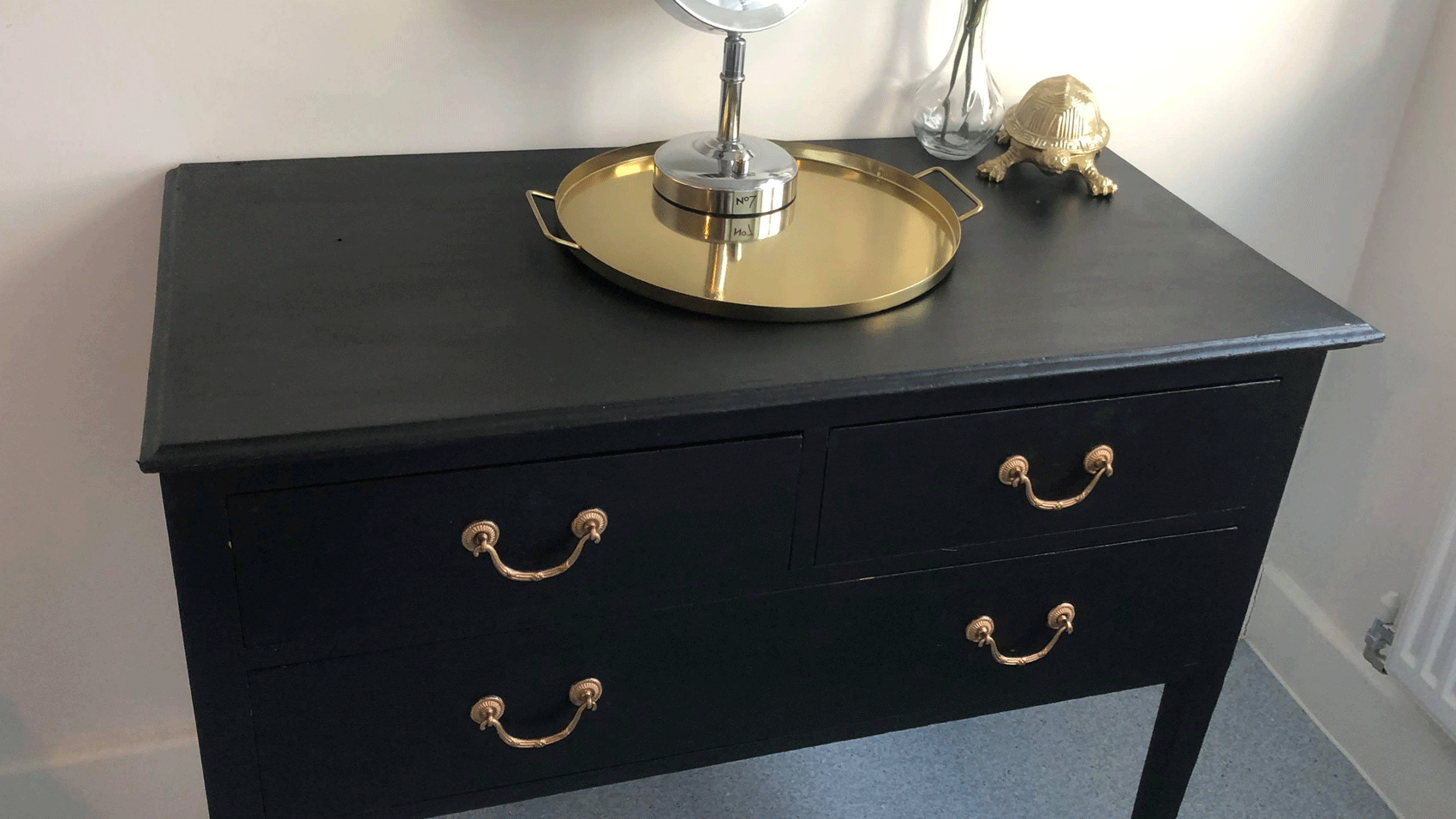 An upcycled Facebook marketplace freebie gets a new life as a chic side table