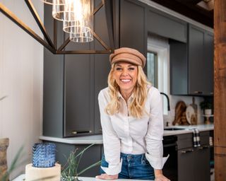 Kortney Wilson's modern kitchen with blue cabinets and quartz countertops