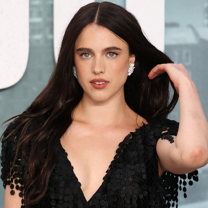 Margaret Qualley styled the barefoot Chanel sandals at the premiere of 'The Dog Stars'