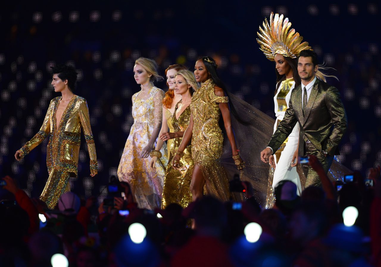 ritish model Stella Tennant, British model Lily Cole, British model Karen Elson, British model Kate Moss, British model Naomi Campbell, British model Jourdon Dunn and British model David Gandy perform at the Olympic stadium during the closing ceremony of the 2012 London Olympic Games in London on August 12, 2012.