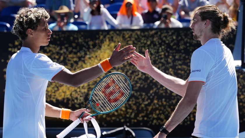 Alexander Zverev of Germany shakes hands with Gabriel Diallo of Canada 