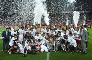 Sevilla players celebrate their Copa del Rey final win over Atletico Madrid at Camp Nou in May 2010.