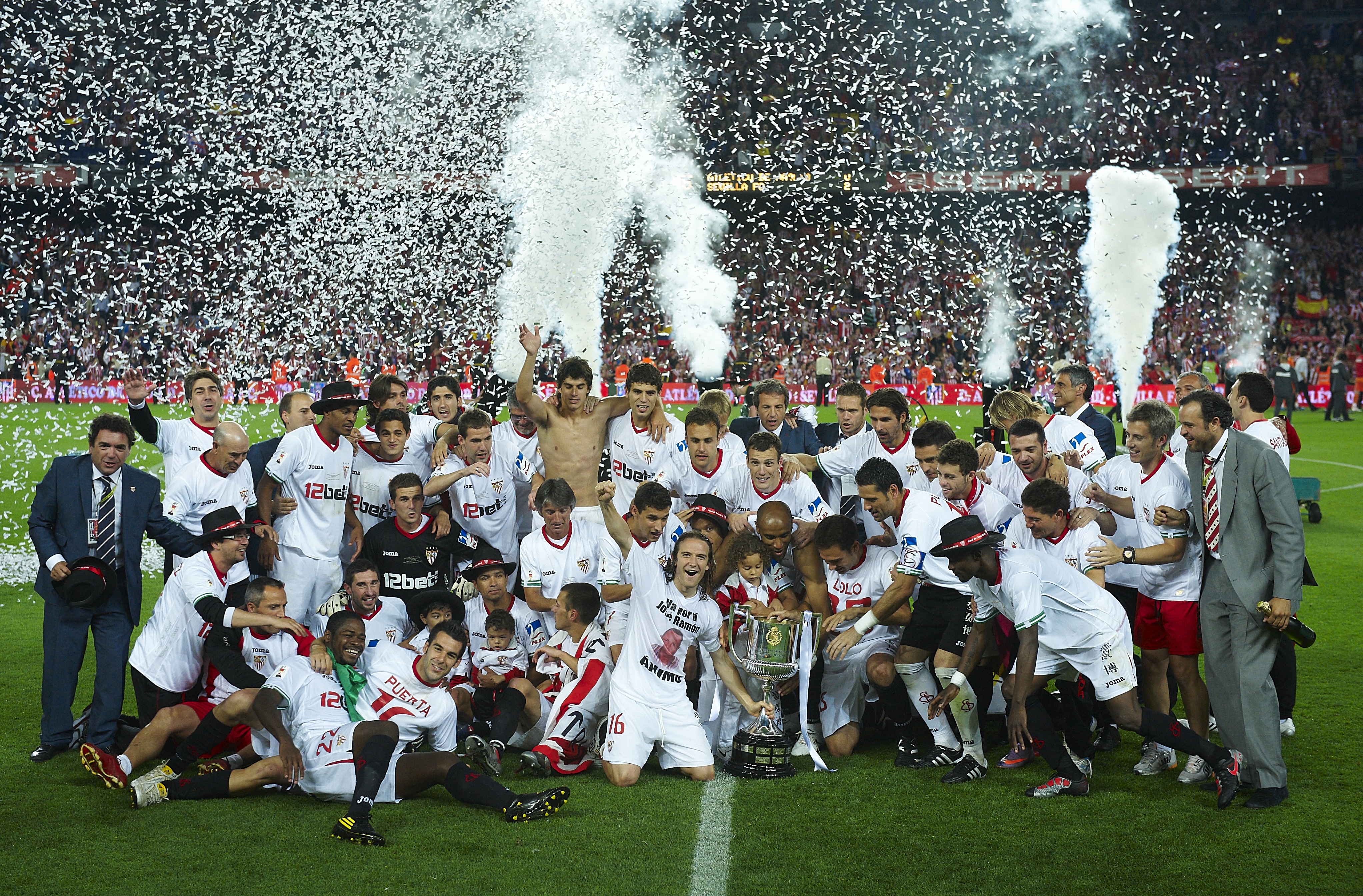 Sevilla players celebrate their Copa del Rey final win over Atletico Madrid at Camp Nou in May 2010.