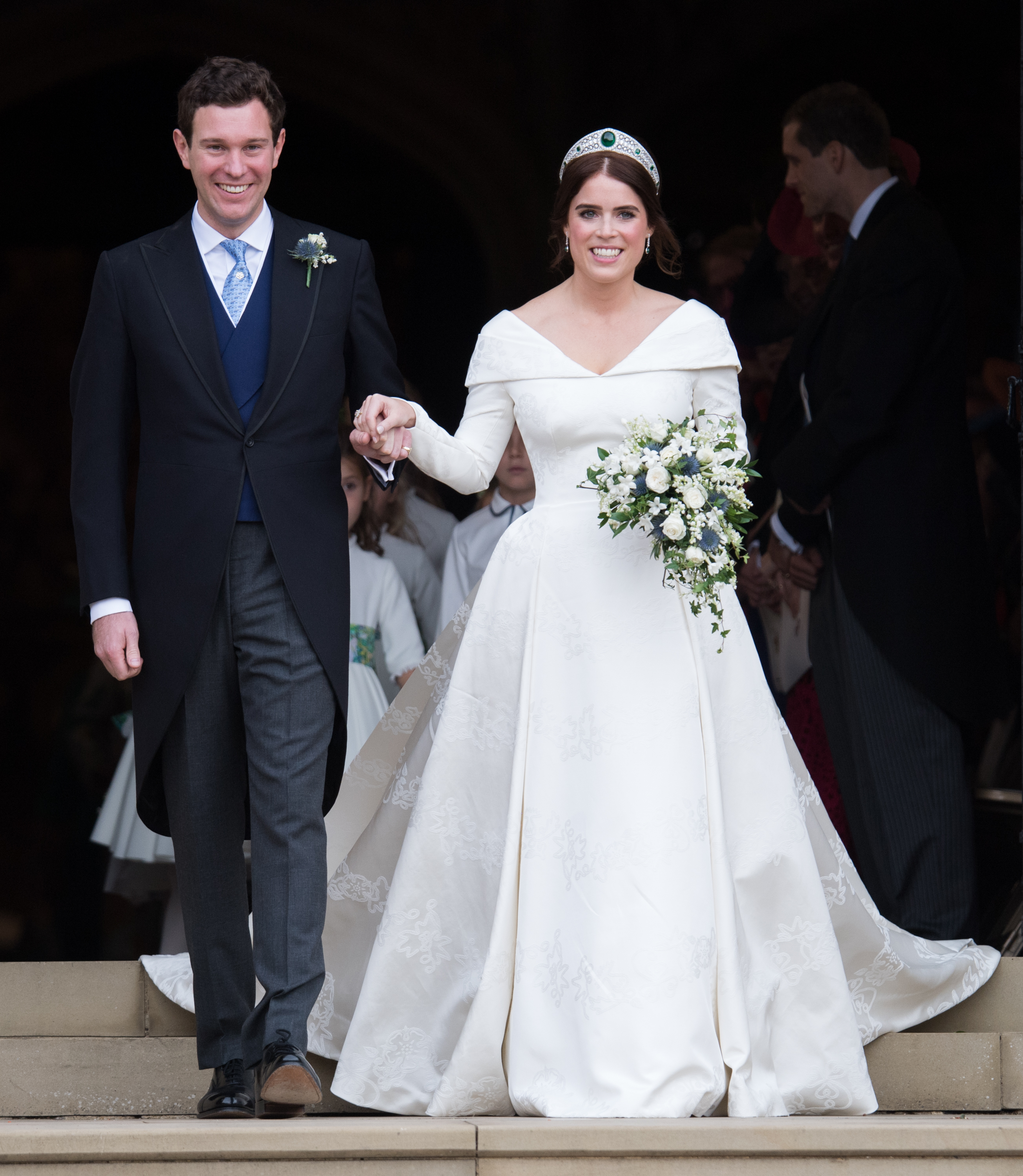 Princess Eugenie and Jack Brooksbank at their wedding holding hands